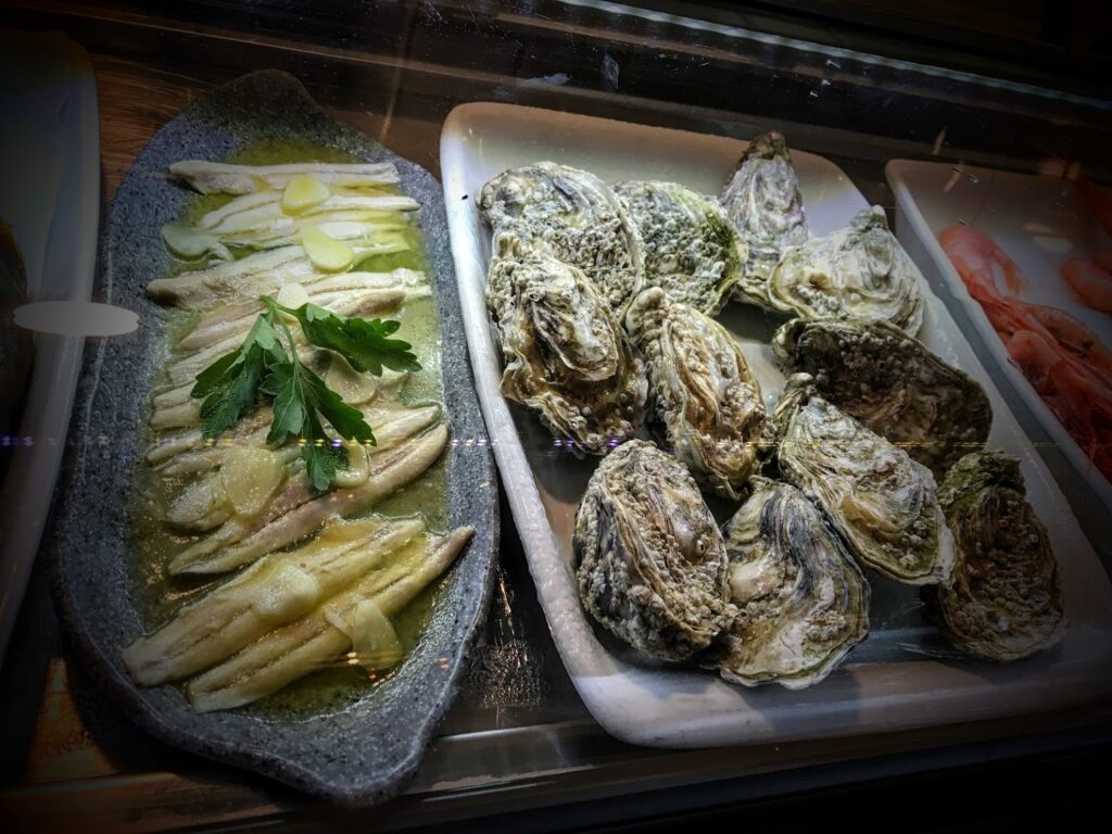 ostras y boquerones en vinagre en el laurel ostras y boquerones en vinagre en el laurel